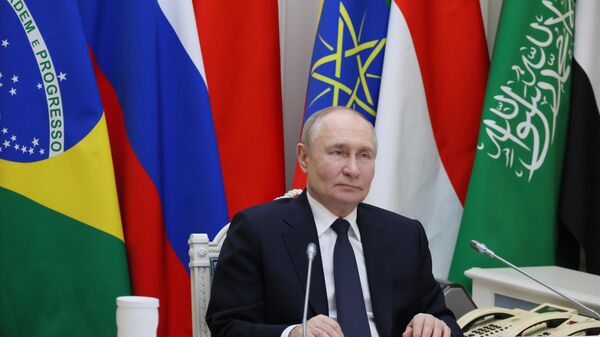 Путин: нужно шире использовать возможности Нового банка развития БРИКС